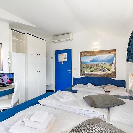 Bike & Wind Hotel Villa Maria Torbole Sul Garda Exterior photo